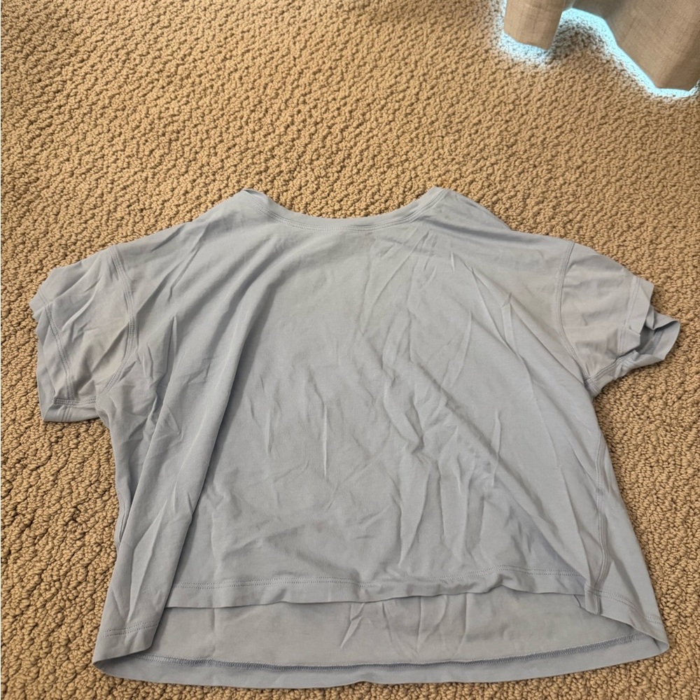 Lululemon cropped tee light blue Top